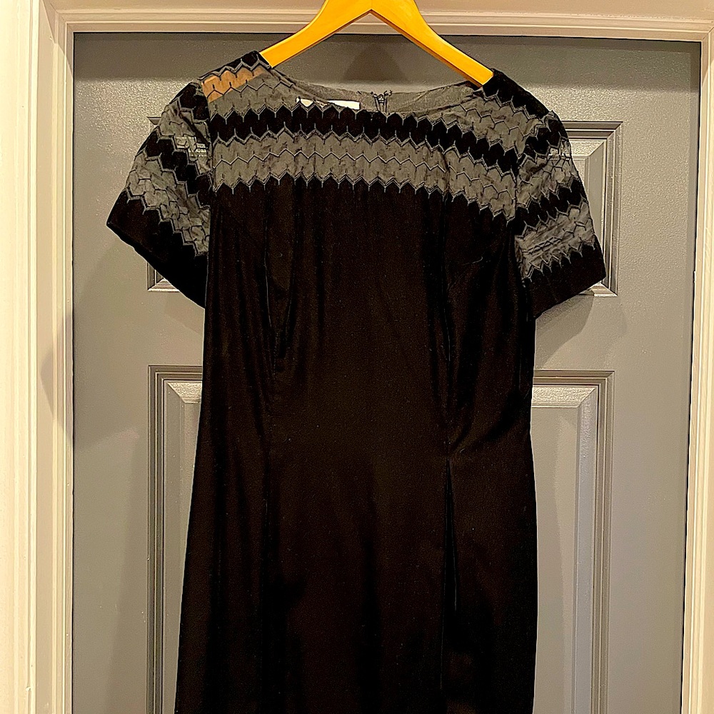 Black Velvet knee length.  Wore once for wedding.